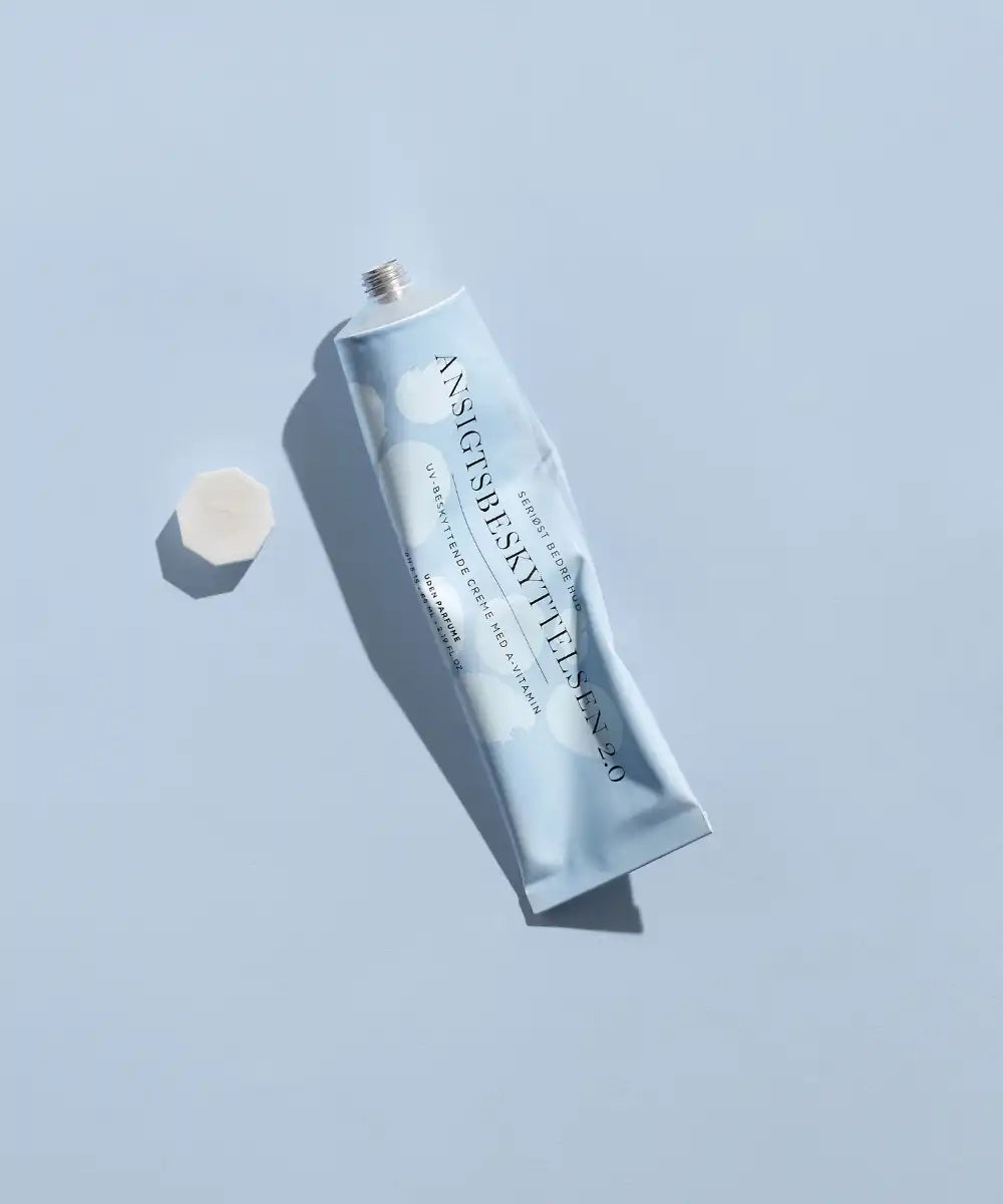 Ansigtsbeskyttelsen blå bagggrund- gladhud